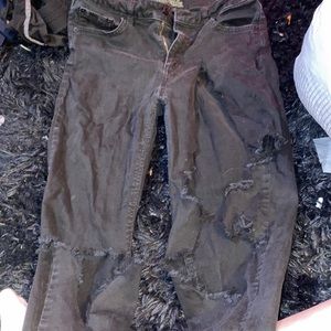size 4 ripped black jeans, the rip goes kind of high